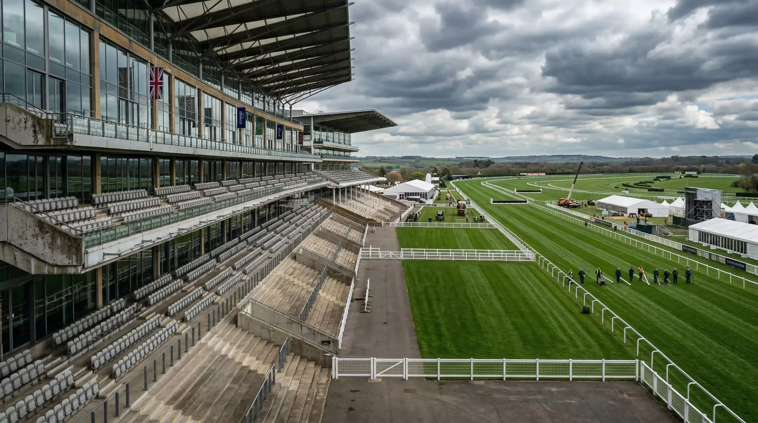 Empty racecourse grandstand weeks before a major festival with preparation work underway